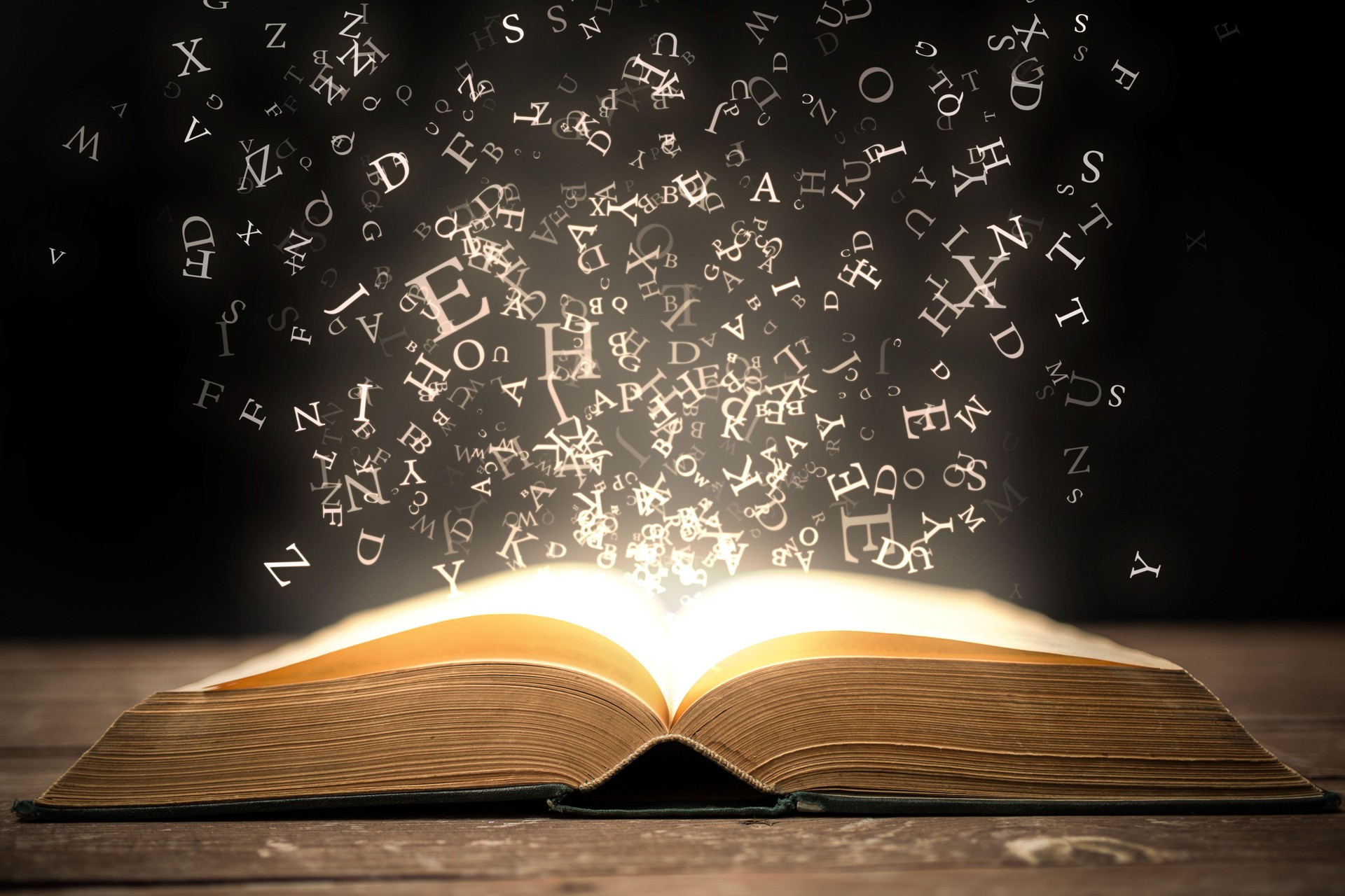 Book and glowing letters