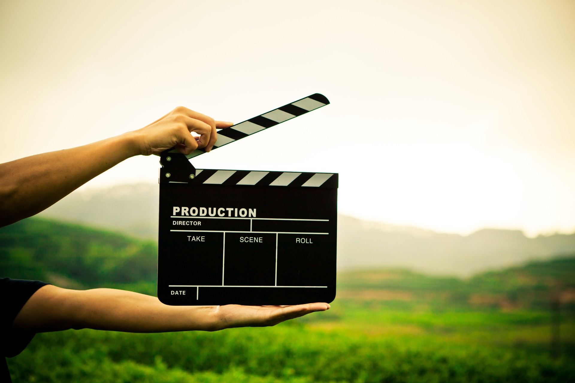 clapper board with hand
